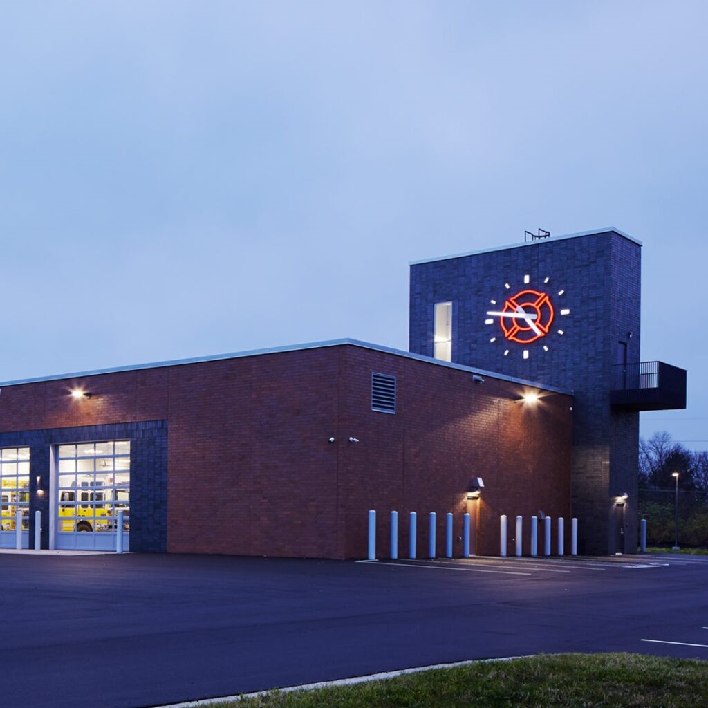 12-FOOT DIAMETER CLOCK FOR FIRE STATION
ILLUMINATED TOWER CLOCK ON FIRE STATION